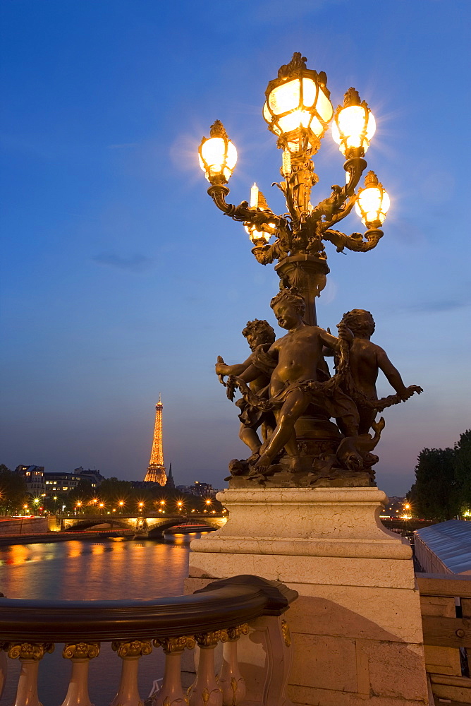 View of the Eiffel Tower from Pont Alexandre III at dusk, Paris, France, Europe