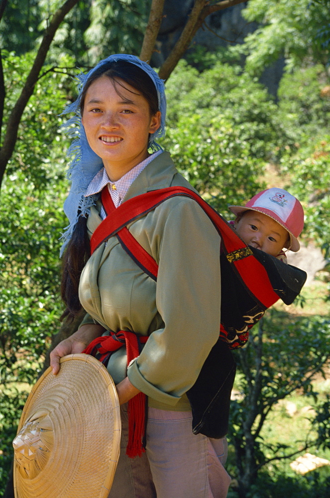 Portrait of mother and baby, Kunming, China, Asia