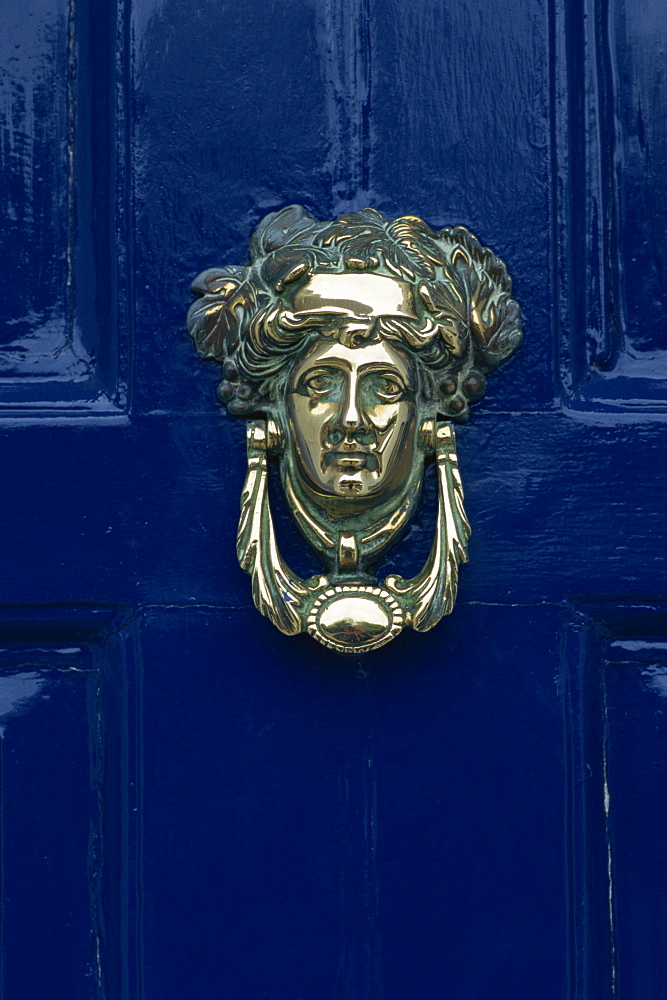 Blue painted door and knocker in the centre of the city of Dublin, Eire, Europe