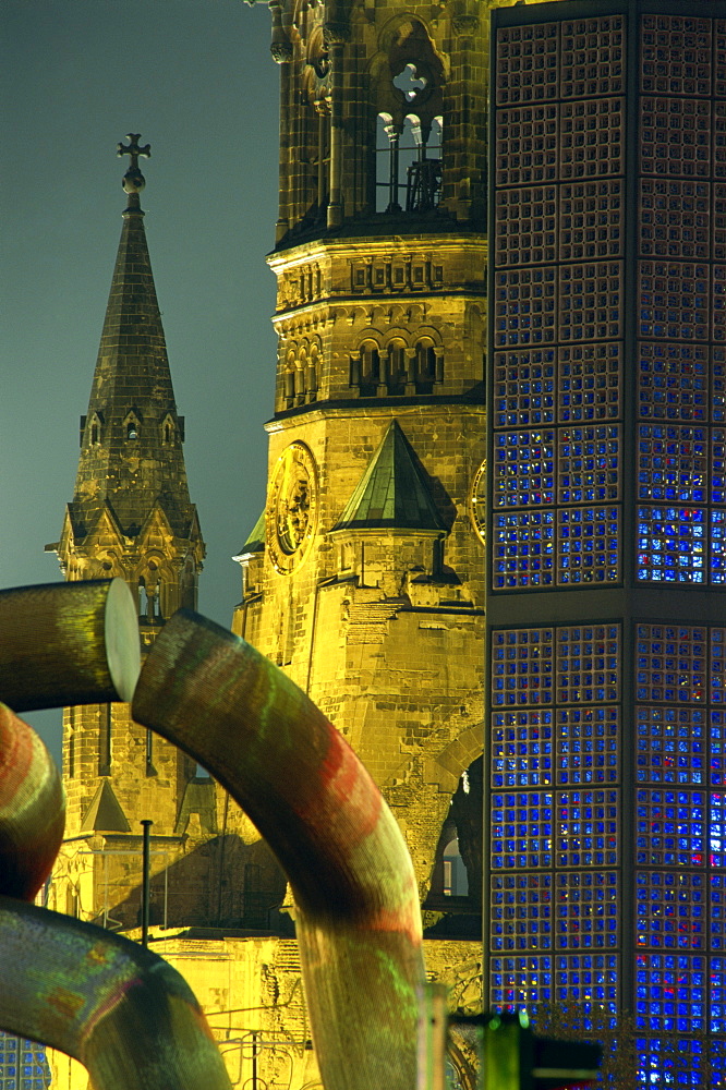 The Kaiser Wilhelm church illuminated at night on the Kurfurstendam in Berlin, Germany, Europe