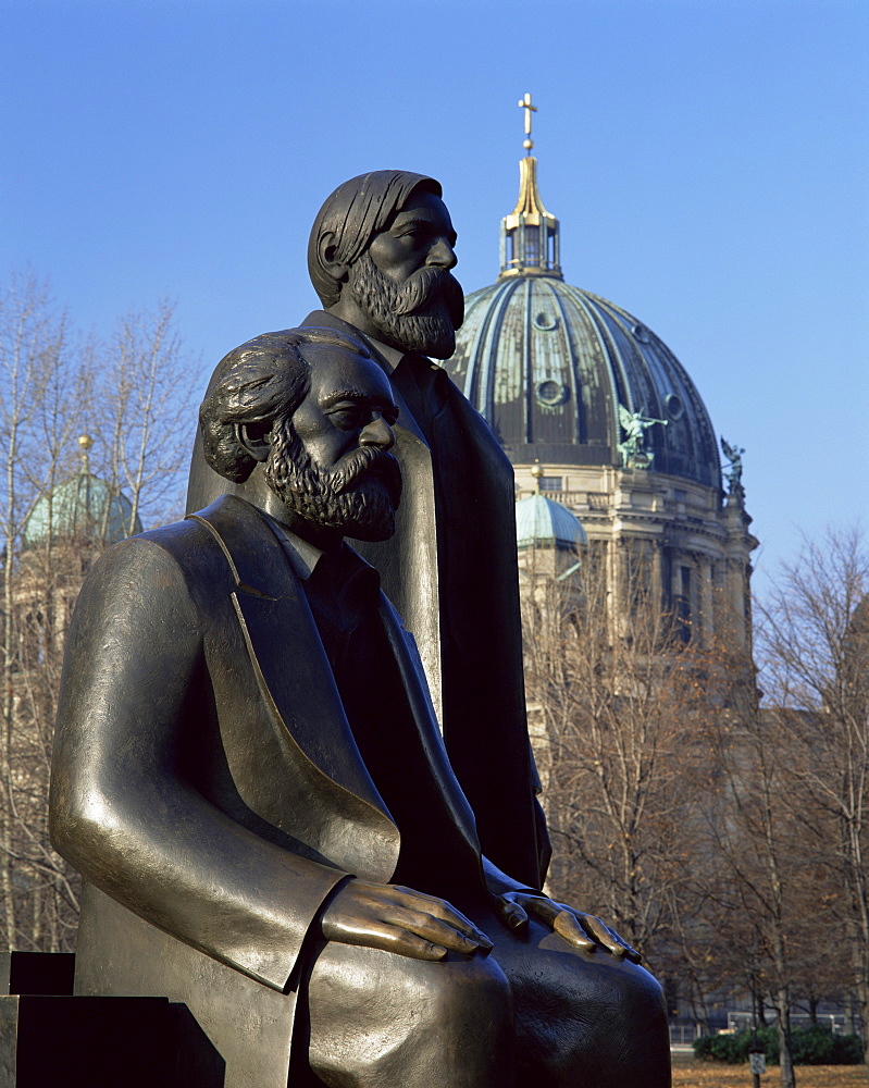 Statues of Marx and Engels, with the Dom (cathedral), behind, Berlin, Germany, Europe