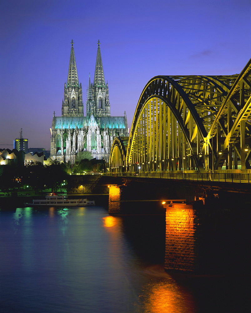 Bridge over the River Rhine, and cathedral (Dom), Cologne (Koln), North Rhine Westphalia, Germany, Europe