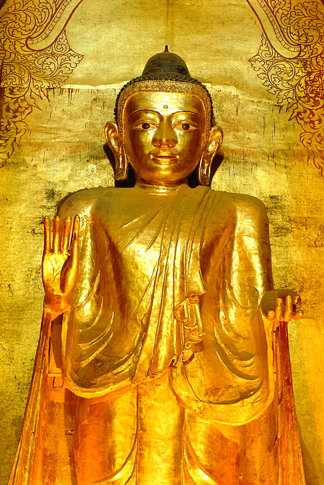 Standing Buddha statue, Ananda Pahto Temple, Bagan (Pagan), Myanmar (Burma)