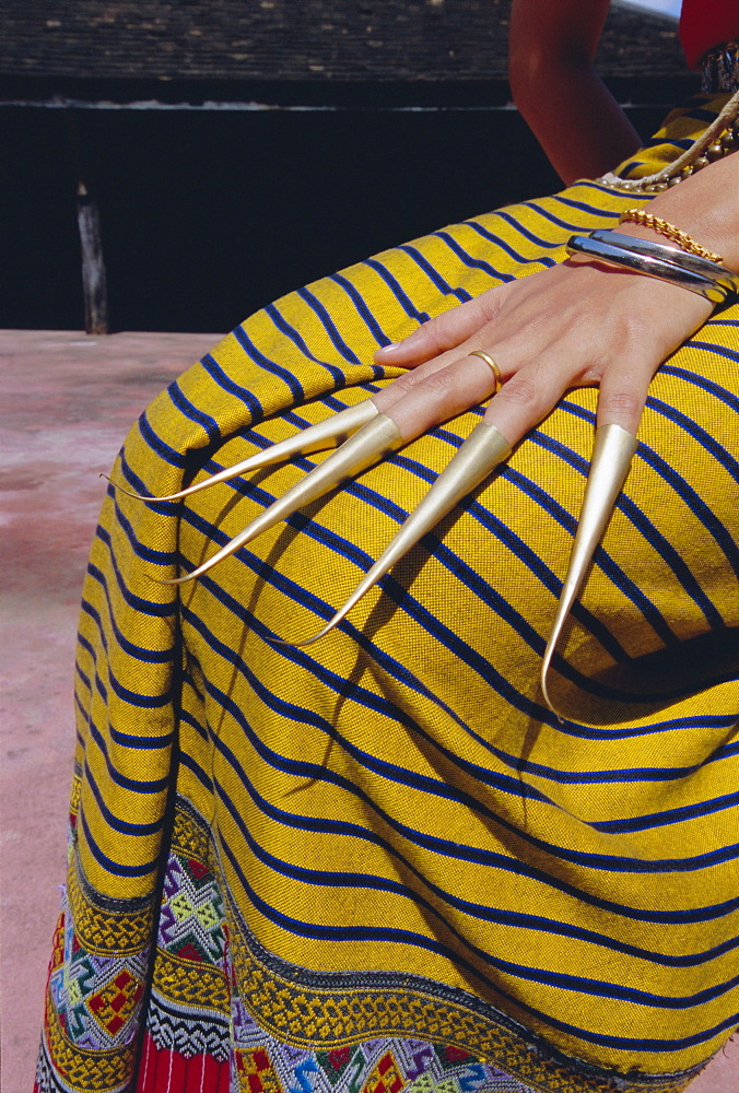 Detail of hand and skirt of a Thai dancer, Chiang Mai, northern Thailand, Asia