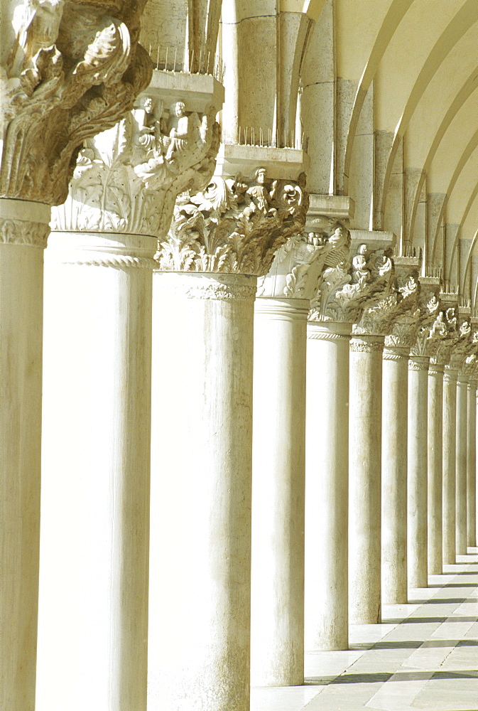 White columns of the Ducale Palace, St Marks Square, Venice, Italy 