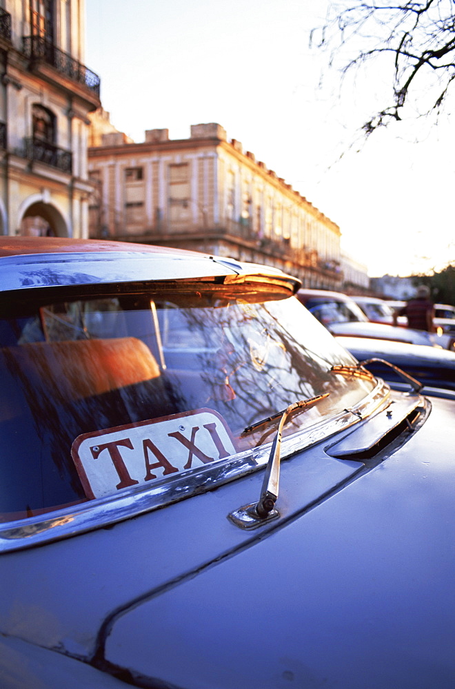 Classic American car with Taxi sign in windscreen, Havana, Cuba, West Indies, Central America