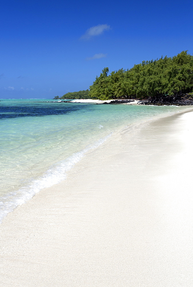 Idyllic beach scene with blue sky, aquamarine sea and soft sand, Ile Aux Cerfs, Mauritius, Indian Ocean, Africa