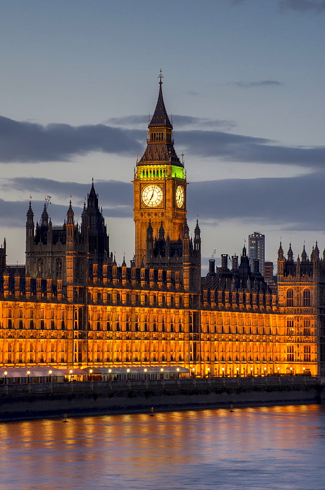 Big Ben clock tower stands above the Houses of Parliament at dusk, UNESCO World Heritage Site, Westminster, London, England, United Kingdom, Europe