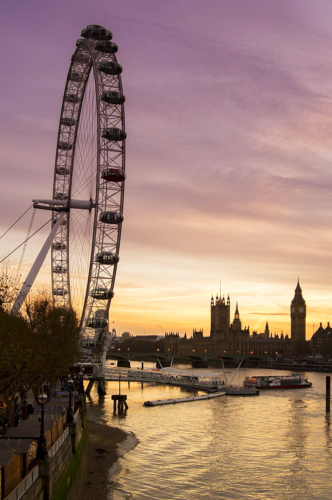 Victoria Tower, Big Ben, Houses of Parliament and London Eye overshadow the River Thames at dusk, London, England, United Kingdom, Europe