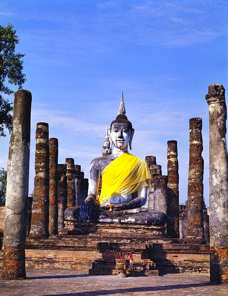 Statue of the Buddha With Religious Offerings, Wat Mahathat, Sukothai, Thailand