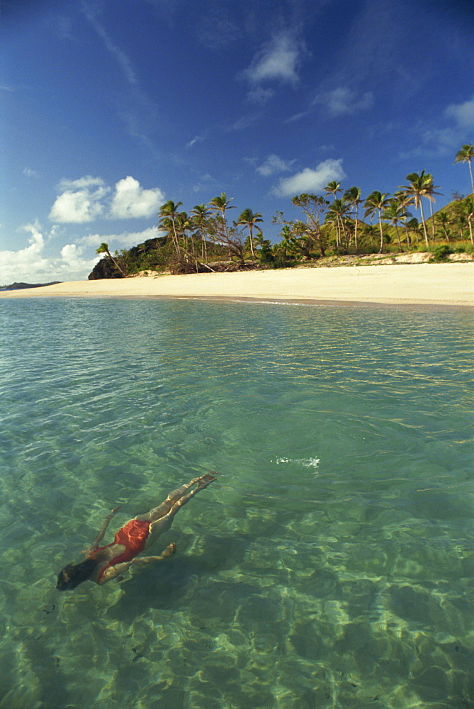 Girl swimming underwater, Yasawa Island, Fiji, Pacific Islands, Pacific