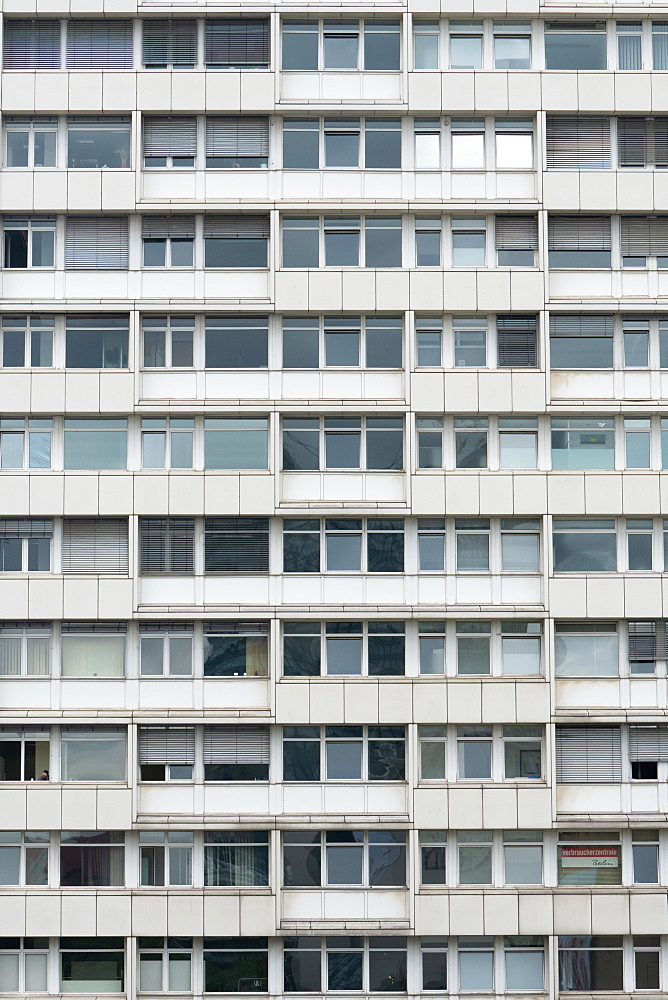 White and grey uniform facade of old apartment block, Berlin, Germany, Europe