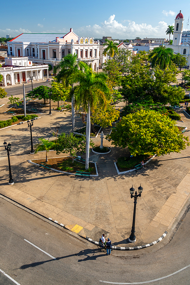 Aerial view of Parque Jose Marti with men chatting by a lamp-post, Cienfuegos, Cuba