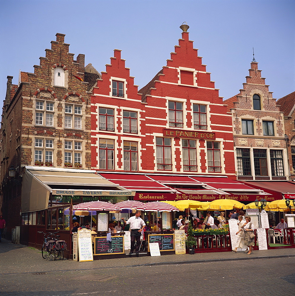 Outdoor cafe facades, Market Square, Bruges, Belgium, Europe