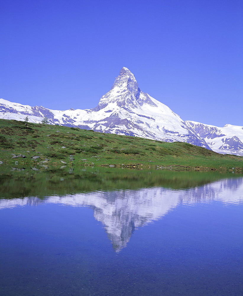 The Matterhorn reflected in Lake Leisse, Valais (Wallis), Swiss Alps, Switzerland, Europe