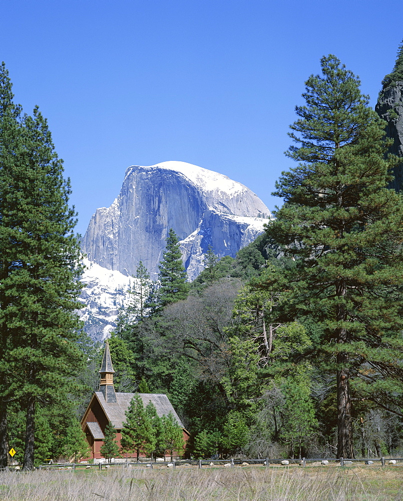 Half Dome mountain peak and chapel, built in 1879, the oldest building still in use, Yosemite National Park, UNESCO World Heritage Site, California, United States of America (USA), North America