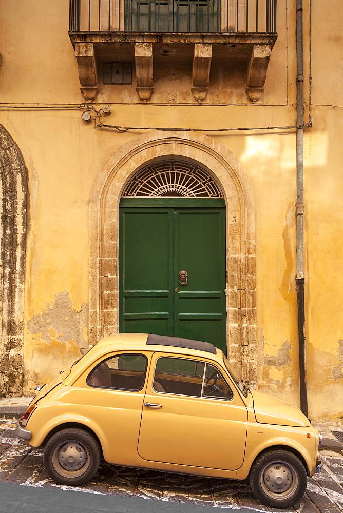 Old Fiat 500 parked in street, Noto, Sicily, Italy, Europe