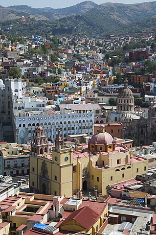 The Basilica de Nuestra Senora de Guanajuato, the yellow building in foreground, with the blue grey building of the University of Guanajuato behind, in Guanajuato, UNESCO World Heritage Site, Guanajuato State, Mexico, North America