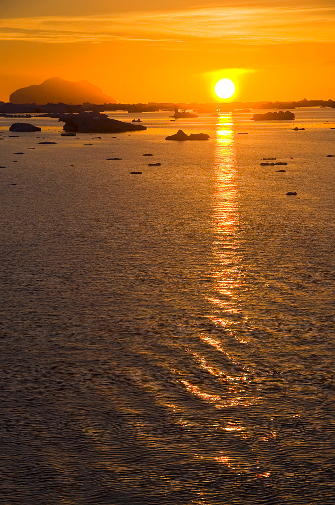 Sunrise on ice in the Antarctic Sound, Antarctic Peninsula, Antarctica, Polar Regions