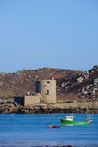 Fishing boat, Cromwell's Castle on Tresco, Isles of Scilly, England, United Kingdom, Europe