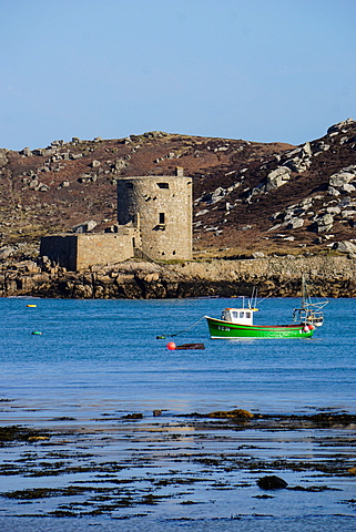 Fishing boat, Cromwell's Castle on Tresco, Isles of Scilly, England, United Kingdom, Europe