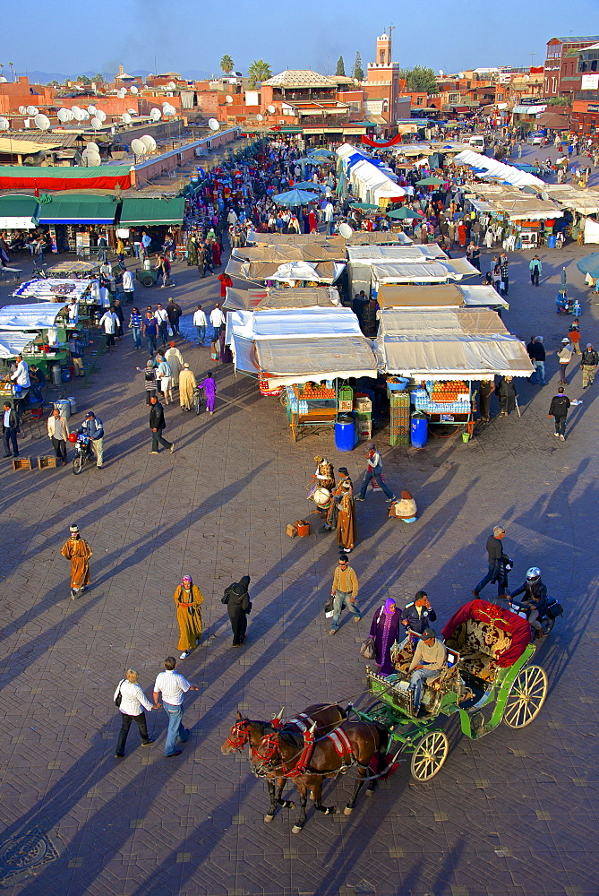 Restaurants, terraces, Kharbouch mosque and minaret, Jemaa-el-Fna Square, Marrakech, Morocco, North Africa, Africa