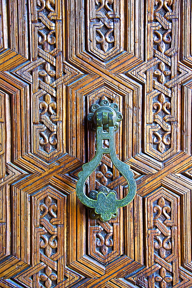 Detail of a wooden door and bronze knocker, Islamo-Andalucian art, Marrakech Museum, Marrakech, Morocco, North Africa, Africa