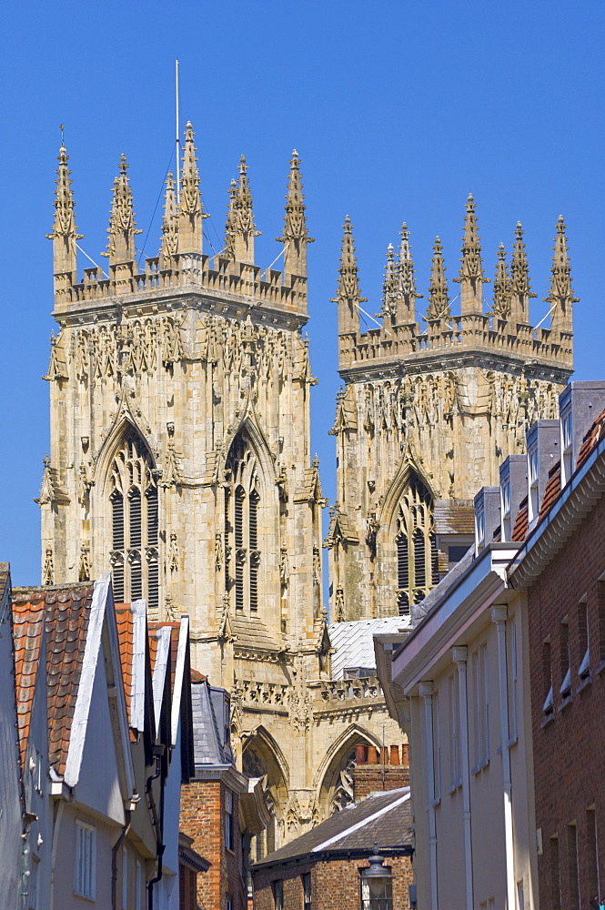 Side view of York Minster, northern Europe's largest Gothic cathedral, from Low Petergate, York, Yorkshire, England, United Kingdom, Europe