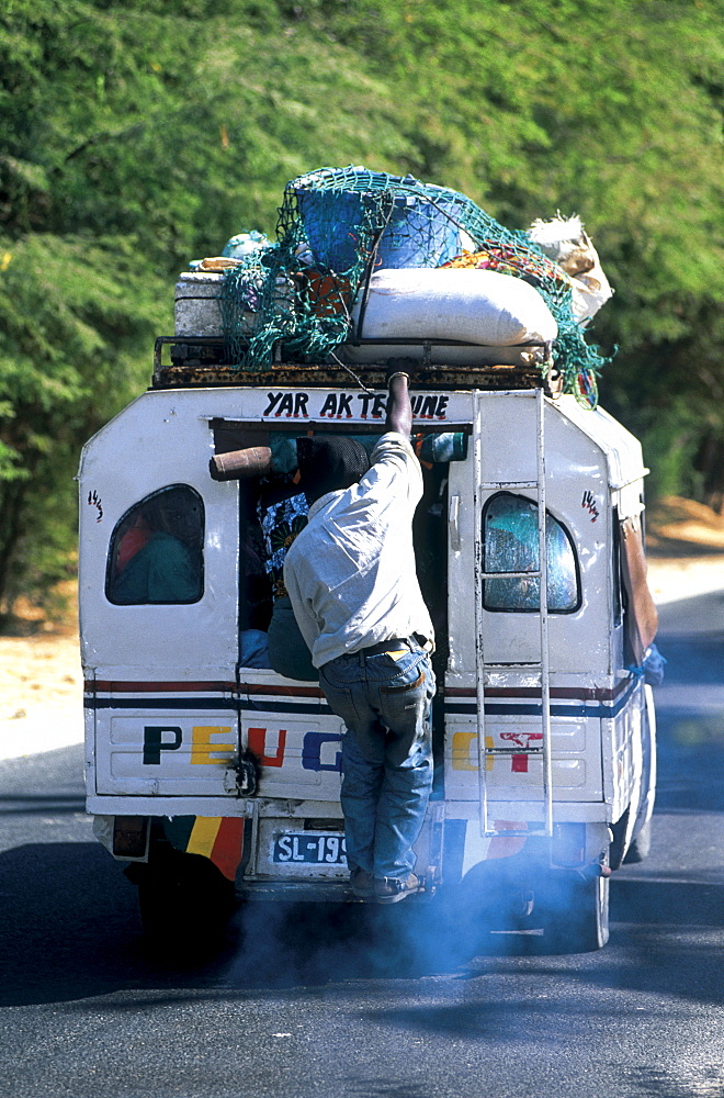 Senegal, Saintlouis, Taxibrousse Or Small Taxi Overloaded Heading To Dakar