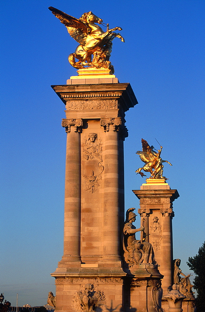 France, Paris, The Alexandre Iii Bridge Stone Piles With Golened Statues On Top