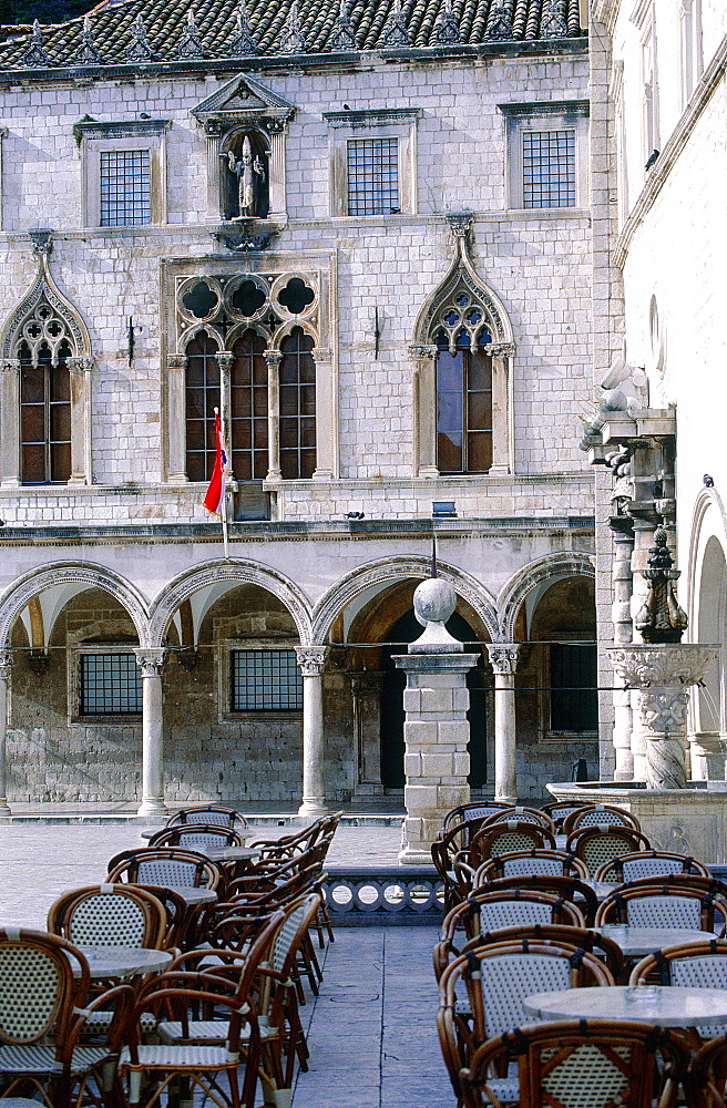 Croatia, Dalmatia, Dalmatian Coast, Fortified City Of Dubrovnik, Palace Sponza (Built In 1516) And Cafe Terrace At Fore On The Stradun