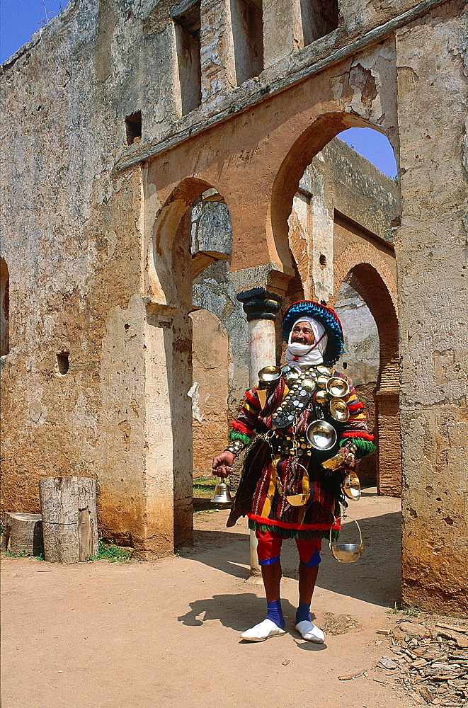 Morocco, Rabat, Mr Mohamed Water Seller In Costume Proposing Free Drink Inside The Chellah Palace Ruins