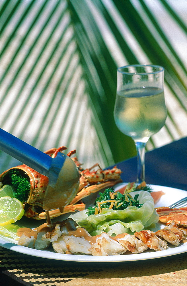 French Polynesia, Tuamotu Archipelago, Atoll Of Rangiroa, Lobster Dish With Glass Of White Wine