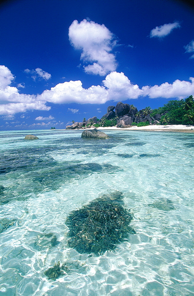 Seychelles, La Digue Island, Source D'argent (Silverspring) Beach Characterized By Huge Basaltic Rocks And Turquoise Lagoon