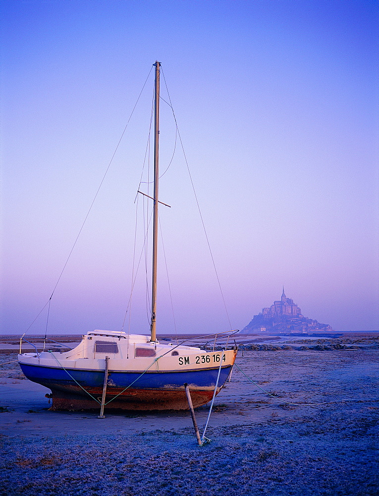 France, Normandy, Manche (50), Mont Saintmichel, Overview On The Mont St Michel At Dawn And Sailing Boat Ashore At Fore