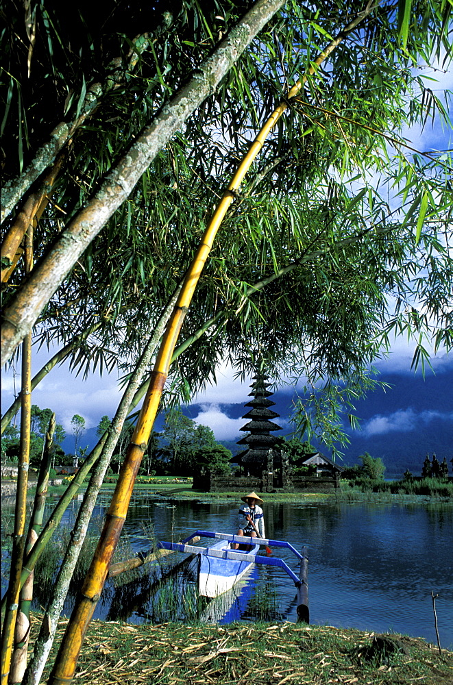 Indonesia, Bali Island, The Lake Bratan Temple And Outrigger At Fore