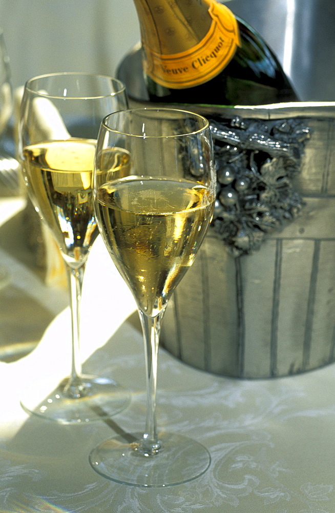 Champagne bottle, bucket and glasses, Royal Champagne Hotel Restaurant, member of Relais et Chateau string, Champignol, Montagne de Reims, Marne, Champagne, France, Europe