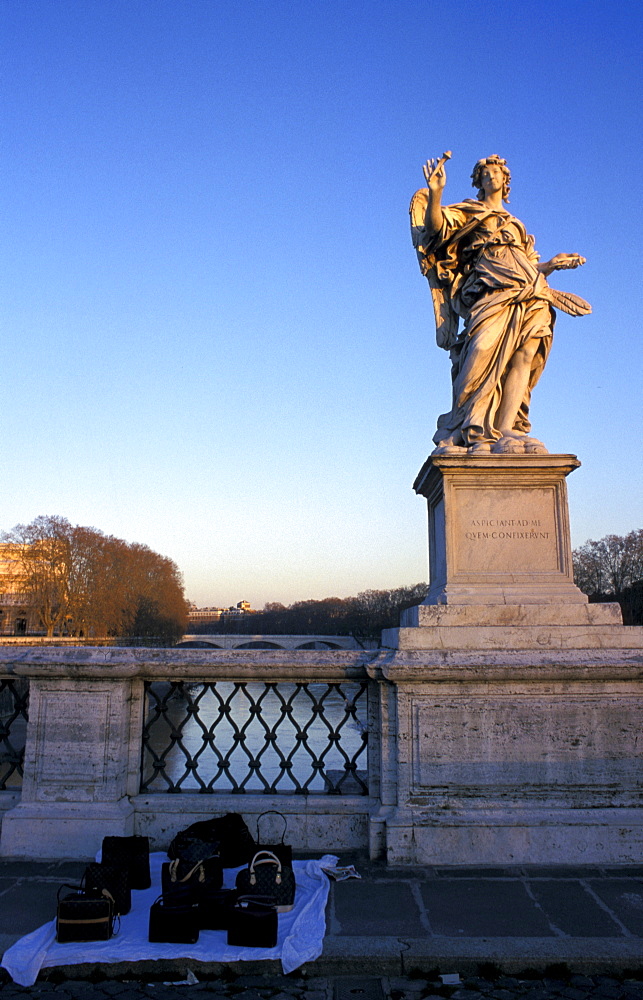 Italy, Rome, Ponte San'angelo, Angel Statues By Bernini, Illegal Bags Seller Stand At Foot