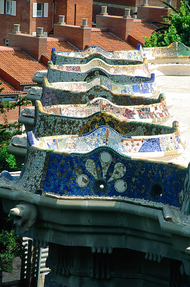 Spain, Catalonia, Barcelona, Park Guell Designed By Gaudi, Row Of Benches Covered With Mosaics