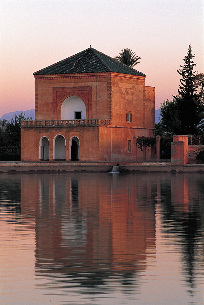 Morocco, Marrakech, La Menara Park, The Main Buiding Reflecting On Pool At Dusk