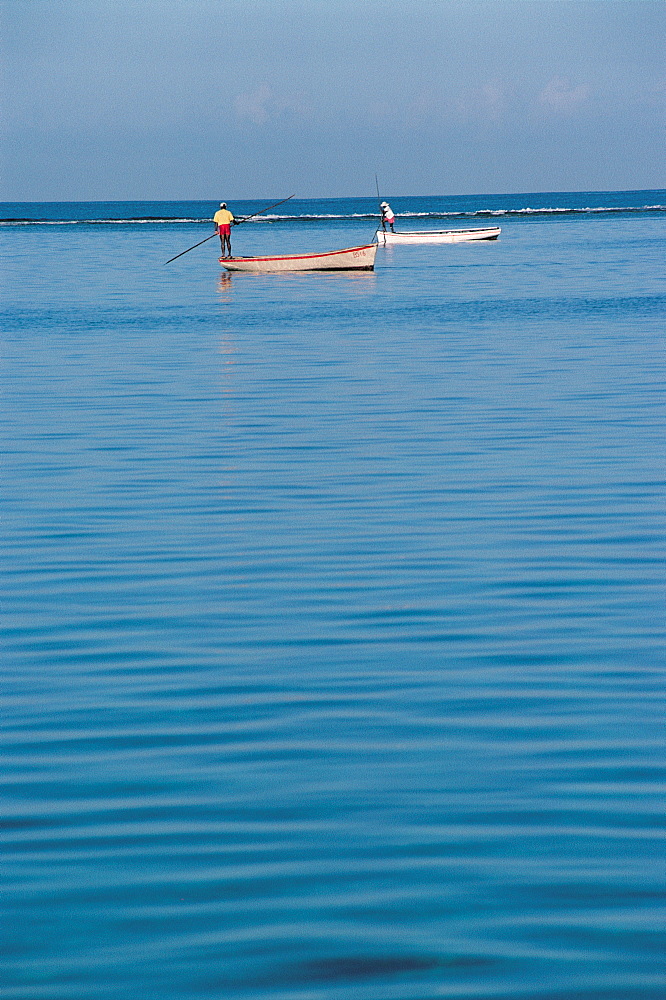 Mauritius, Fishermen On Local Boats In The Lagoon