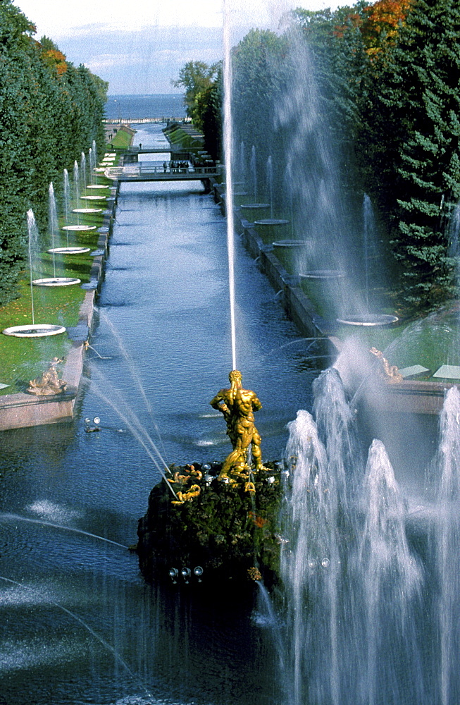 Russia, Saint Petersburg, Peterhof (Petrovorets) Castle And Park, Perspective Of The Canal To The Baltic Sea, Waterworks In Fore 