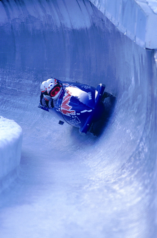 Canada, Ontario In Winter, Bobsleigh Team Of Two During A Race 