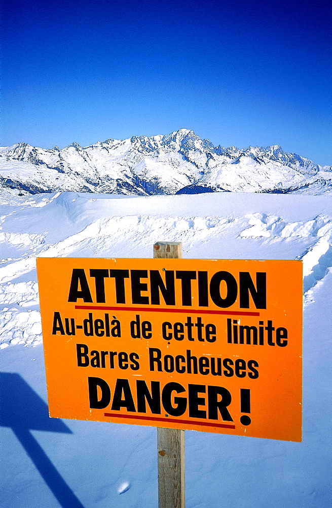 France, Alps In Winter, Notice Board About Dangers On Edge Of A Ski Trail 