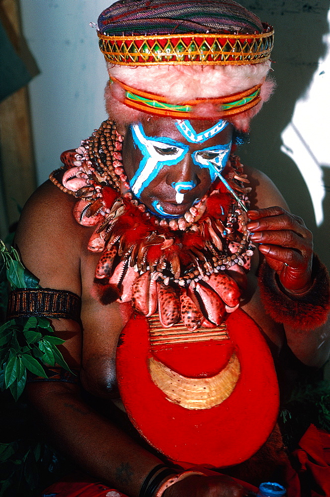 Papua New Guinea, Port Moresby, Traditional Sepik Tribe Sacred Dance, Woman Making Up