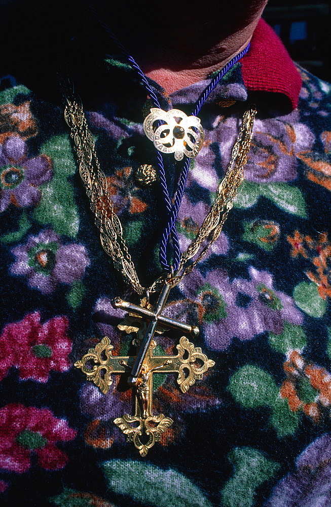 France, Alpes, Savoie, Megeve, Traditional Gold Cross With The Sunday Dress