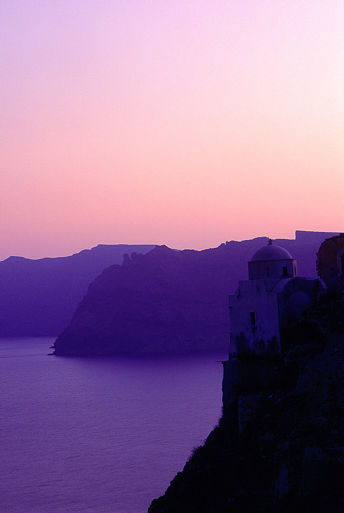 Greece, Cyclades, Santorini Island, The Coastline At Dusk, Remote Chapel On A Cliff