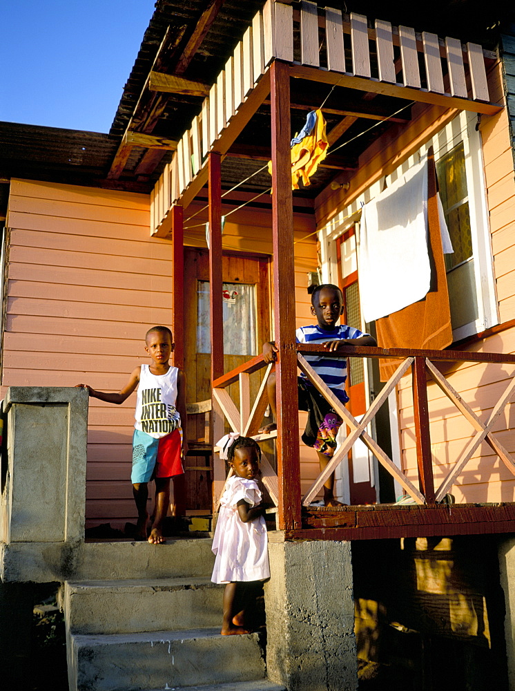 Children in front of a house, Grande Anse Beach, Grenada, Windward Islands, West Indies, Caribbean, Central America