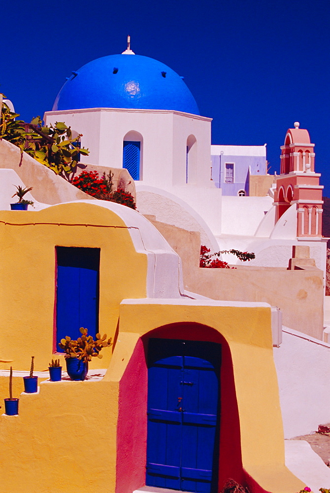 Traditional colour house and church, Oia village, Santorini, Cyclades Islands, Greece