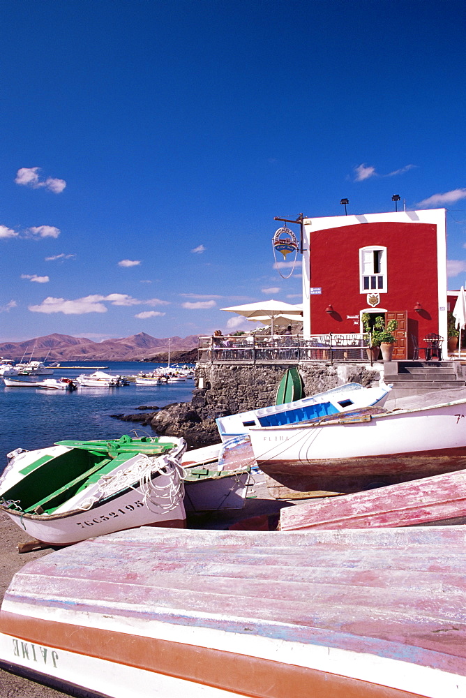 Boats and old red house in the old harbour, Puerto del Carmen, Lanzarote, Canary Islands, Spain, Atlantic, Europe